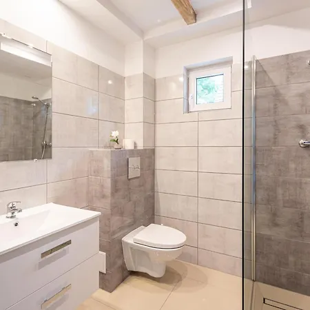 Brick Near Baltic Sea And Windmill *